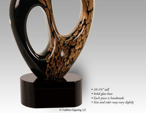 Close-up black and gold glass award
