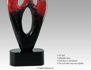 Close-up red and black art glass award