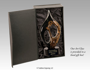 Black and gold glass award in box