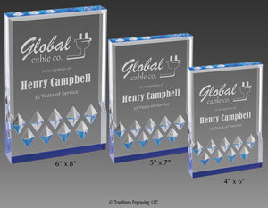 Three sizes of blue Mirage acrylic awards.
