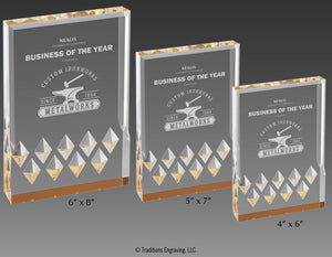 Three sizes of gold Mirage acrylic awards.