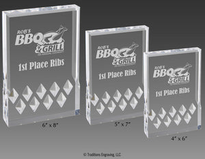 Three sizes of silver Mirage acrylic awards.