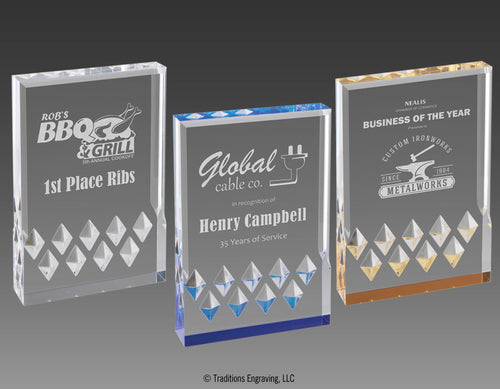Three colors of Mirage acrylic awards, silver, blue and gold.